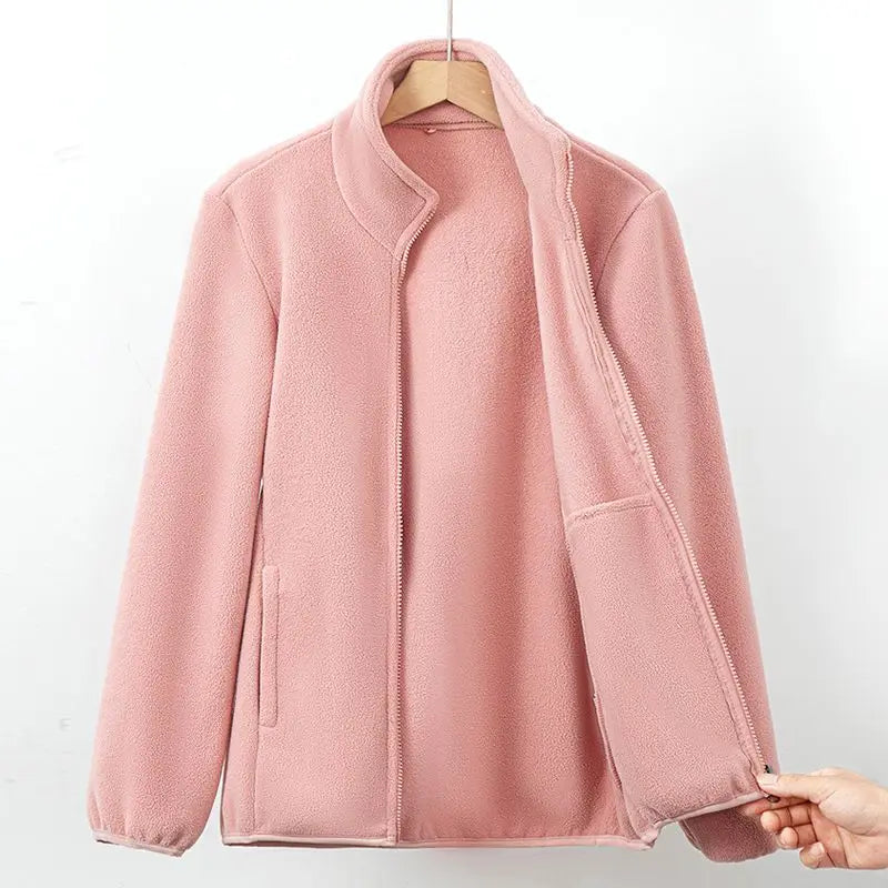 Veste polaire rose poudré zippée, col montant, poches latérales