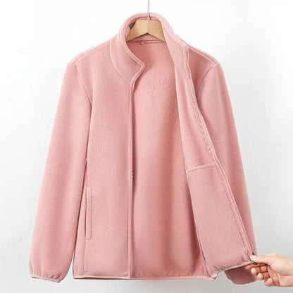 Veste polaire rose poudré zippée, col montant, poches latérales