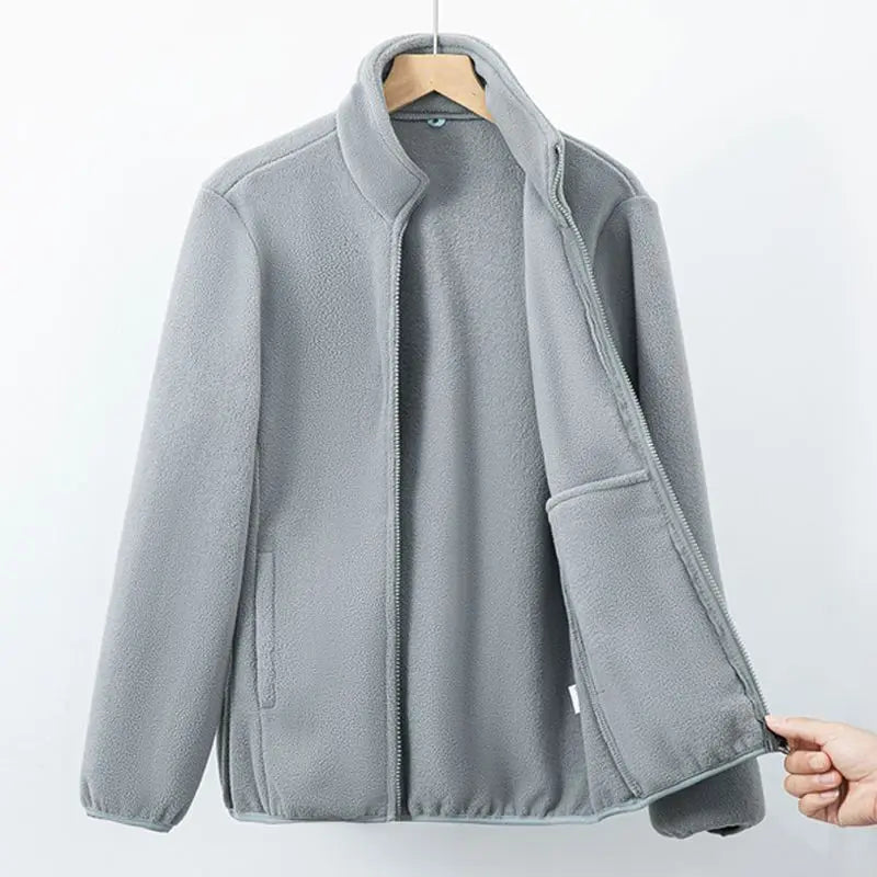 Veste polaire grise à fermeture éclair, col montant, poches latérales