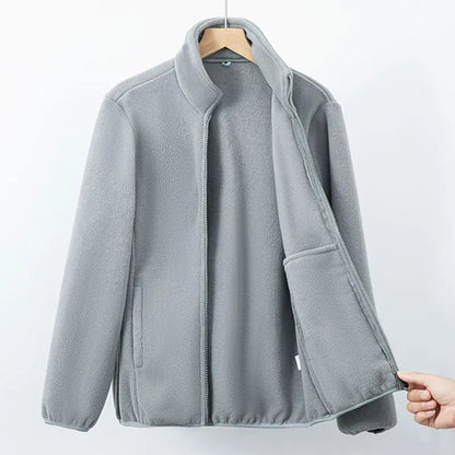Veste polaire grise à fermeture éclair, col montant, poches latérales