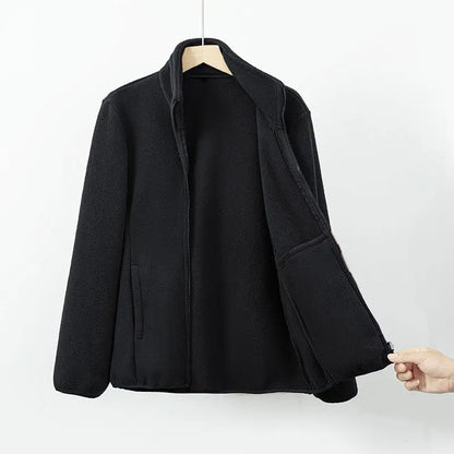 Veste polaire noire zippée avec col montant et poches latérales, coupe chaude