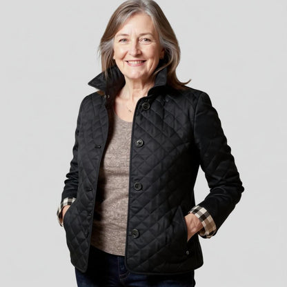 Veste matelassée noire à col chemise, motif losanges, fermeture boutonnée et poignets à carreaux
