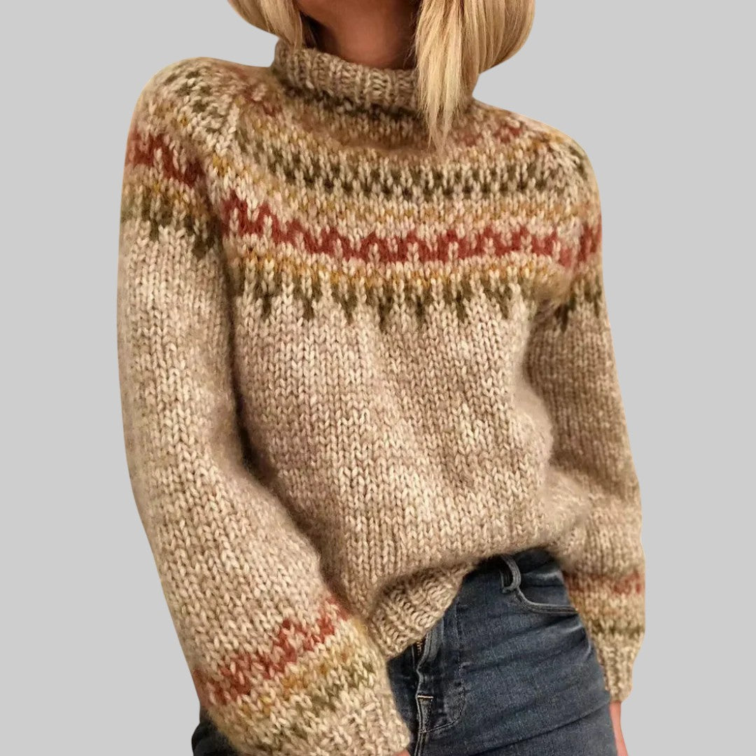 Pull en maille beige à motif jacquard rouge et brun, col montant côtelé