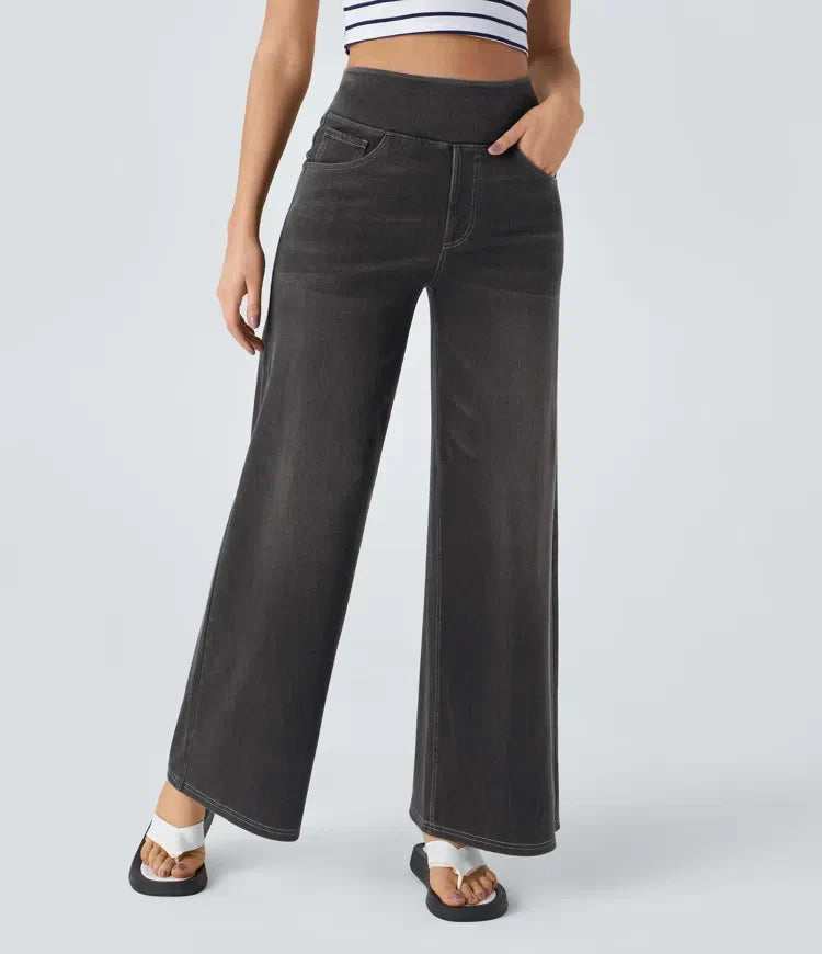 Pantalon en denim gris foncé à jambes évasées, taille mi-haute, poches