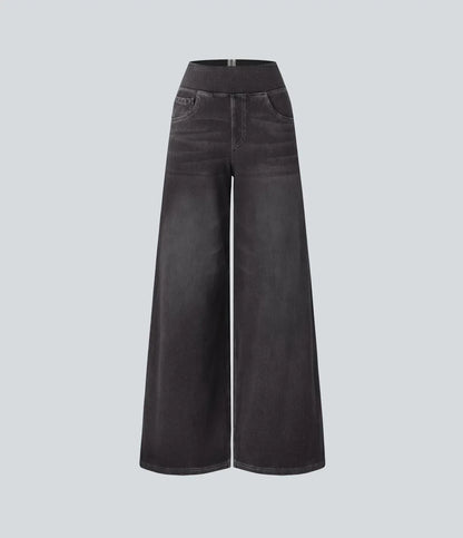Pantalon en jean gris foncé, jambe évasée et taille élastique, vue arrière