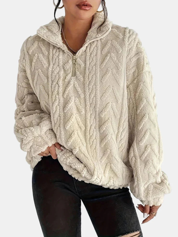 Gilet zippé en maille torsadée beige à col montant et capuche