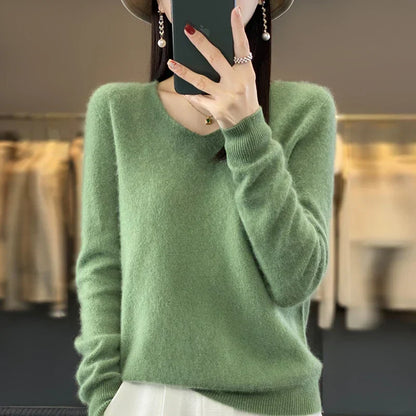 Pull en cachemire Elowen vert, encolure en V avec patte boutonnée, manches longues