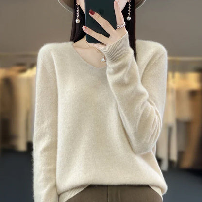 Pull en cachemire Elowen écru, encolure en V avec patte boutonnée, manches longues