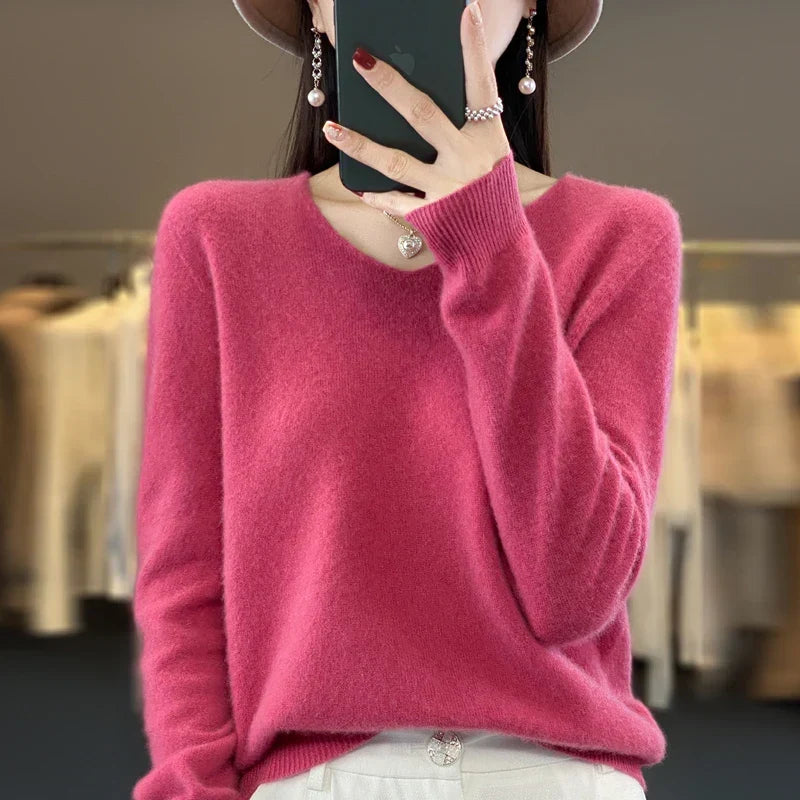 Pull en cachemire Elowen rose, encolure en V avec patte boutonnée, manches longues