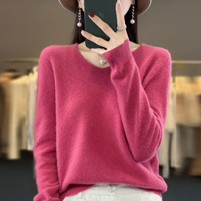Pull en cachemire Elowen rose, encolure en V avec patte boutonnée, manches longues