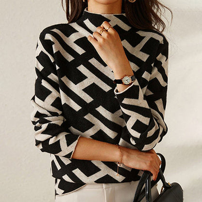 Pull col roulé manches longues noir et blanc, motif géométrique contrasté