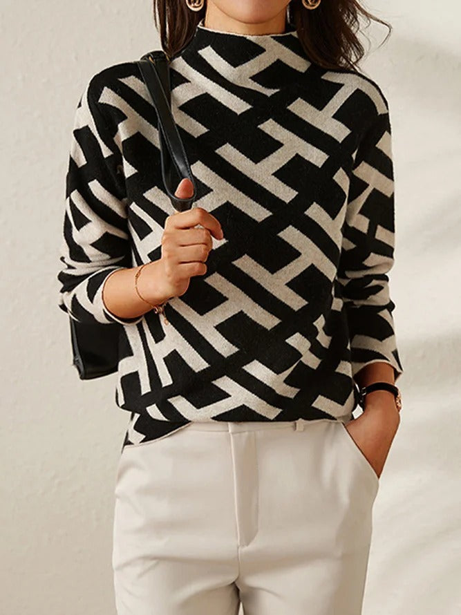 Pull col roulé manches longues noir et blanc à motif géométrique