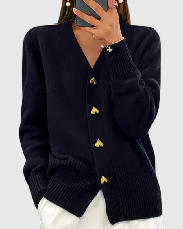 Pull-gilet en maille bleu marine, col V et boutons dorés, manches longues, bas côtelé