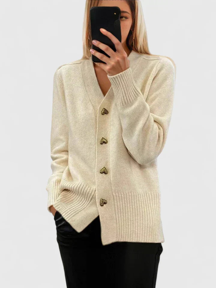 Pull-gilet en maille crème, col V et boutons dorés, manches longues, bas côtelé