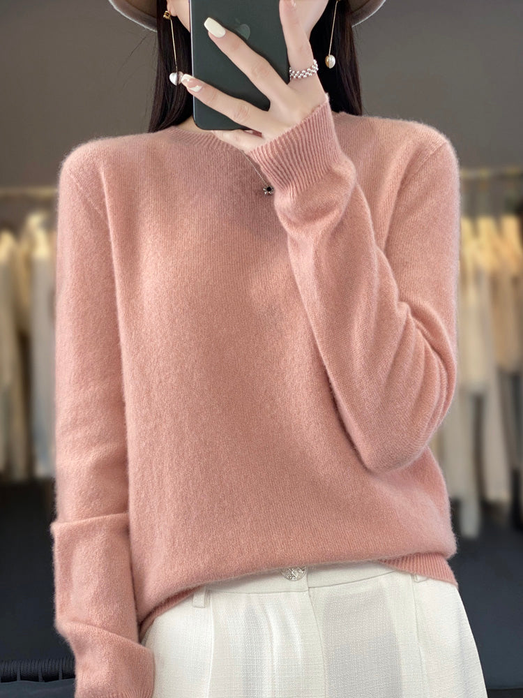 Pull en cachemire rose poudré à col montant, manches longues