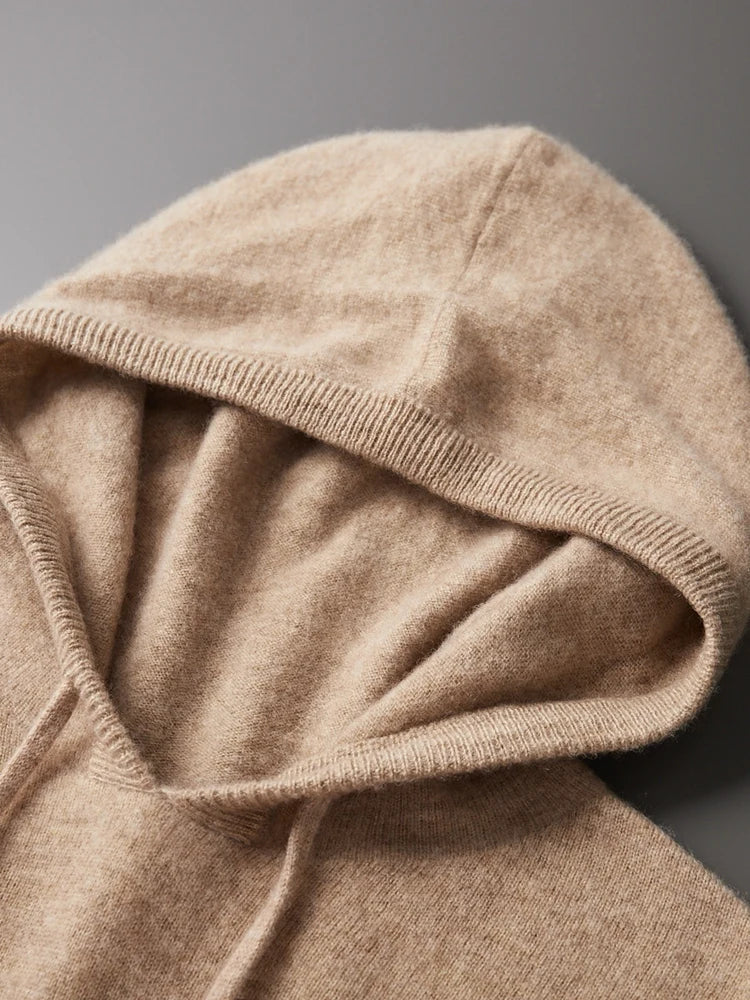 Détail veste à capuche en cachemire beige : capuche et bord côtelé, tissu texturé