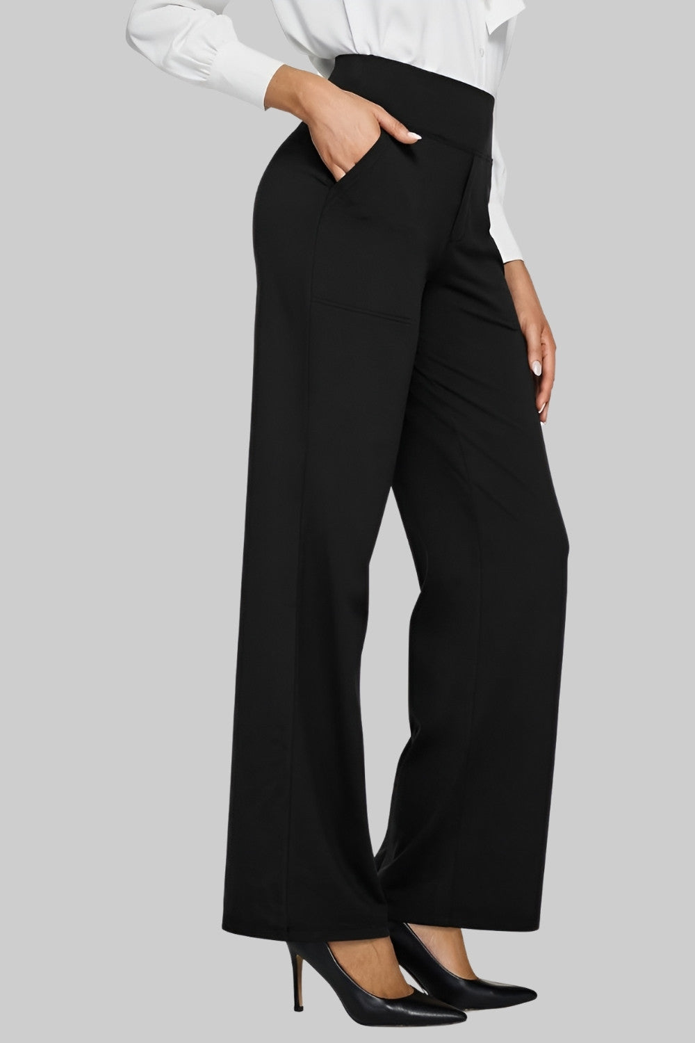 Pantalon confortable noir, taille haute, coupe ample longueur cheville et poches invisibles