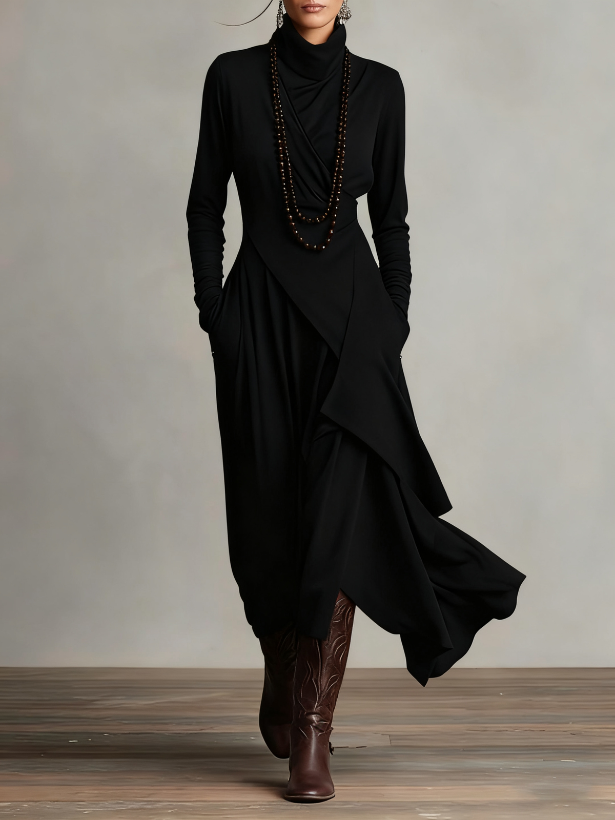 Robe en laine noire à col montant, drapé croisé, jupe ample à pans