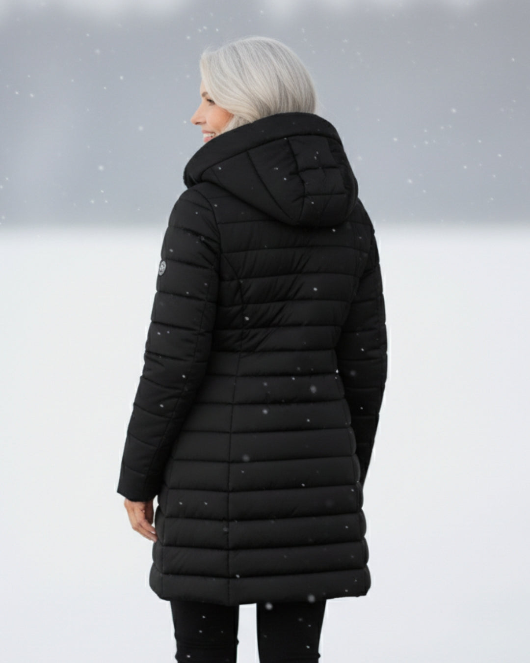 Manteau d’hiver noir matelassé, capuche et longueur mi-cuisse