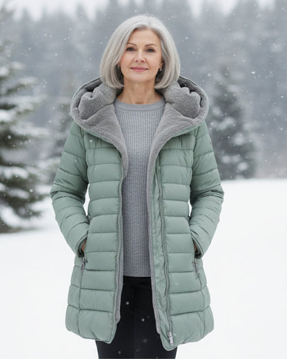 Manteau d’hiver matelassé vert clair à capuche bordée de tissu gris, zippé