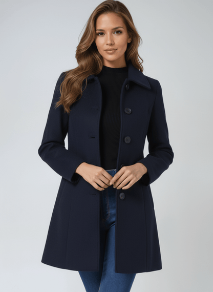 Manteau d’hiver bleu marine à double boutonnage, col droit, mi-long.