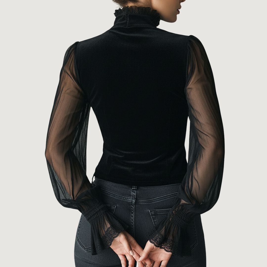 Blouse en dentelle Elvira noire, dos en voile, manches transparentes, col haut.