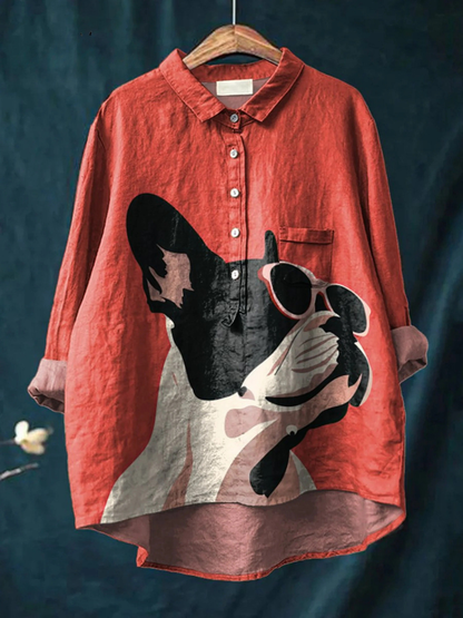 Chemise rouge ample, col boutonné et poche, imprimé chien aux lunettes.