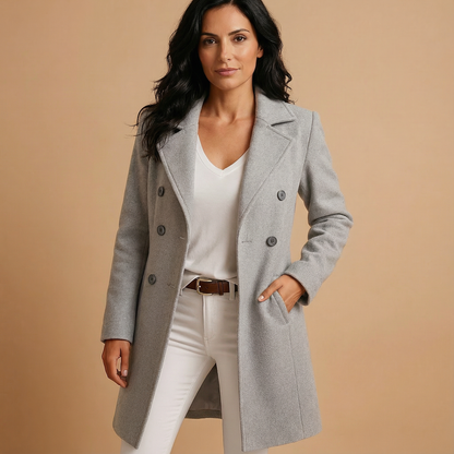 Manteau classique gris à boutons, col en revers et ourlet mi-long.