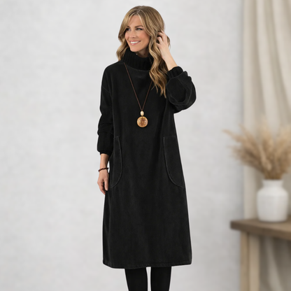 Robe midi noire en tissu doux, col montant, manches longues, poches latérales