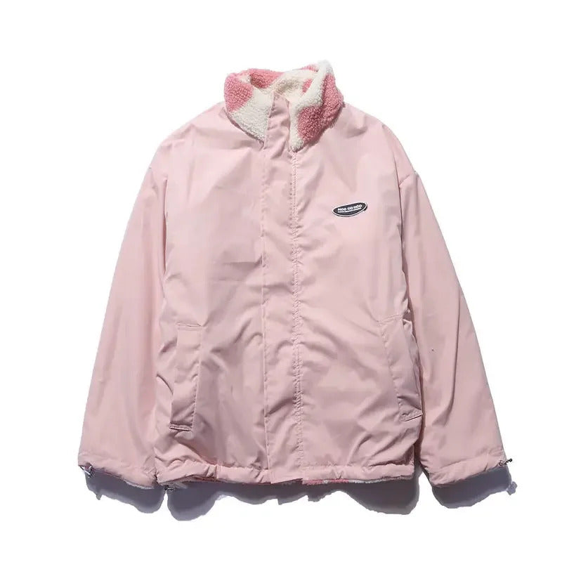 Veste réversible enfant rose pâle, capuche et fermeture zippée, logo poitrine.