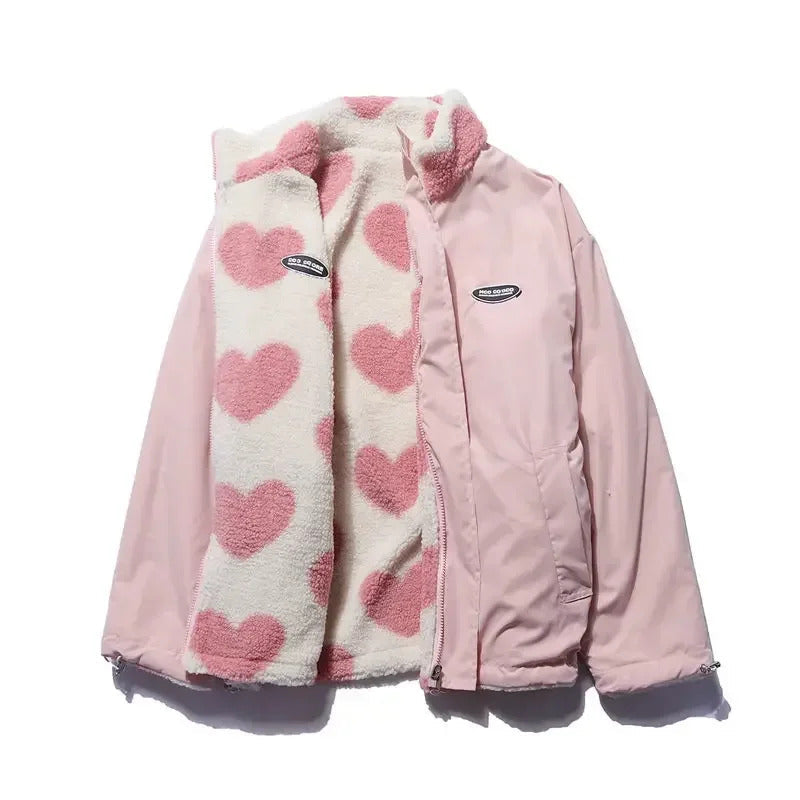 Veste réversible rose : sherpa à cœurs roses sur fond crème, zip sur tissu rose