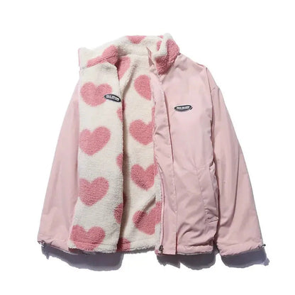 Veste réversible rose : sherpa à cœurs roses sur fond crème, zip sur tissu rose