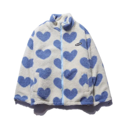 Veste réversible enfant en polaire écrue à cœurs bleus, capuche et zip.