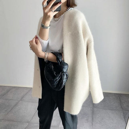 Gilet boutonné en maille douce beige clair, col rond, manches longues