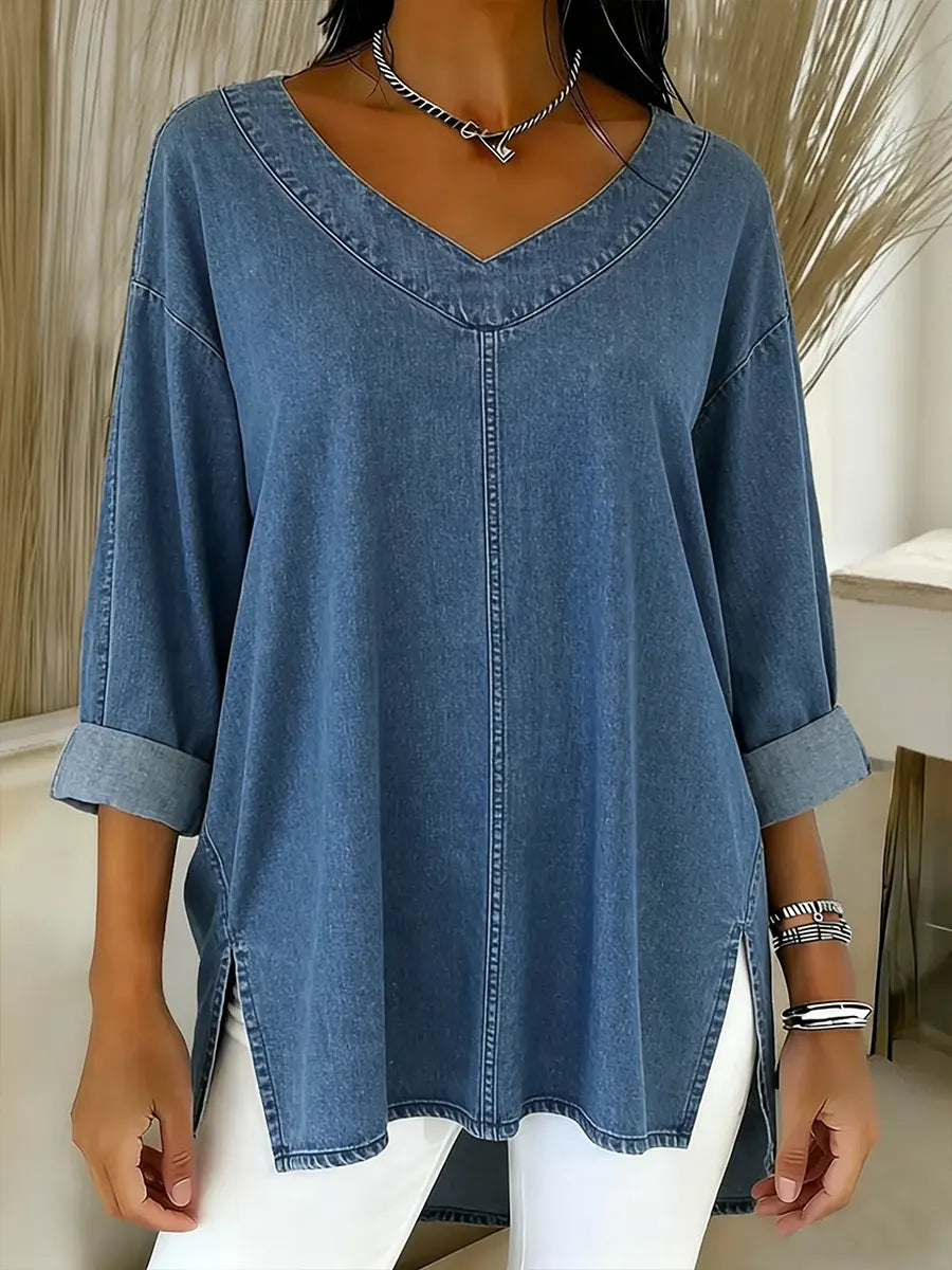 Haut en jean bleu décontracté, encolure V, manches 3/4, couture centrale.