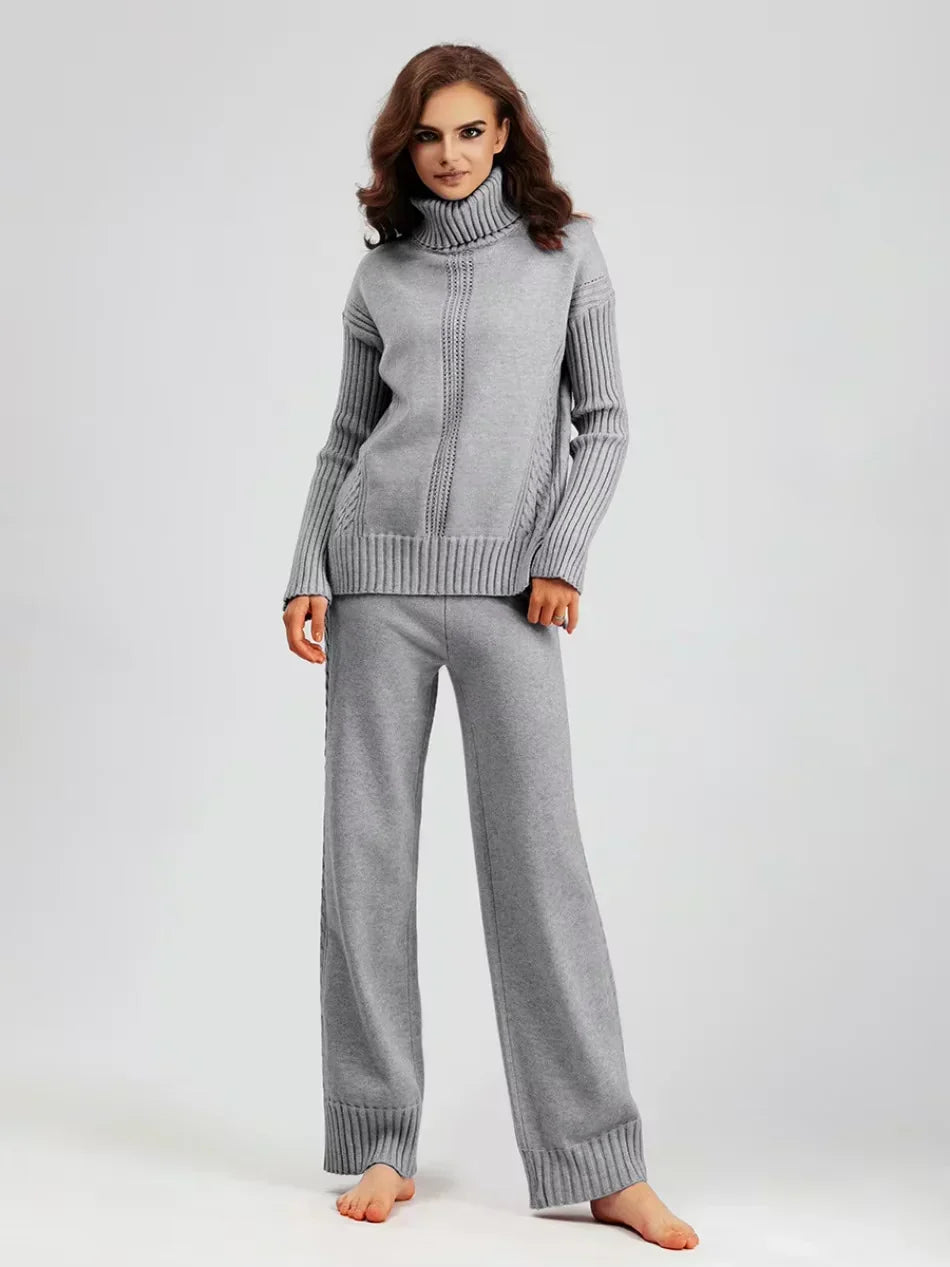 Ensemble tricot pour femme gris : pull col roulé zippé et pantalon long assorti.