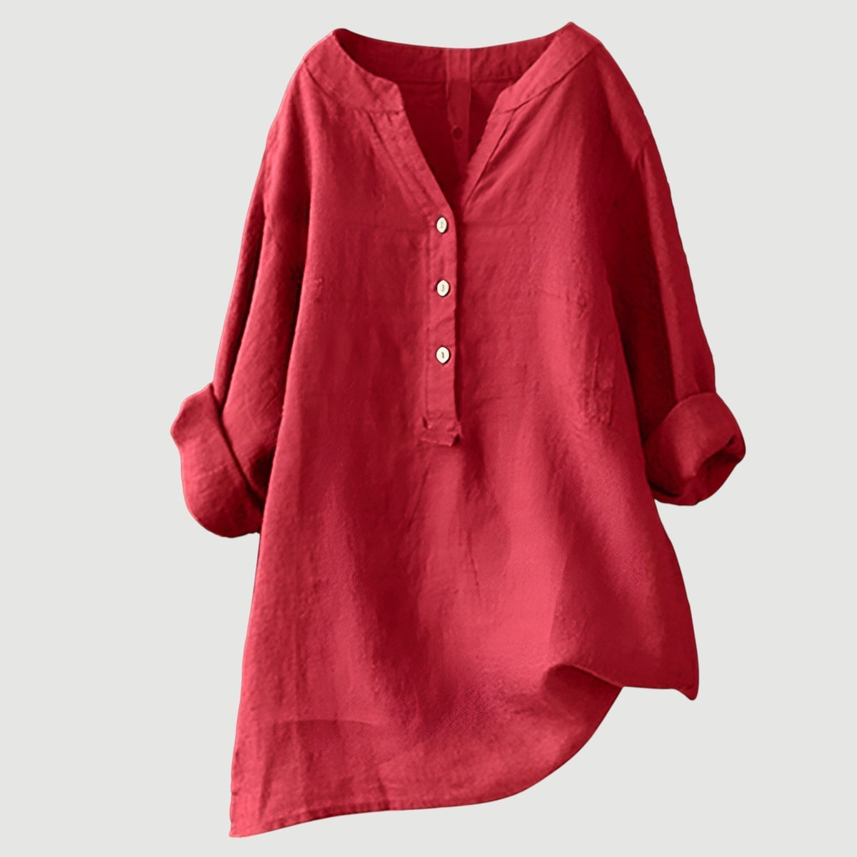 Chemise ample en lin rouge, encolure en V, patte boutonnée, manches larges.