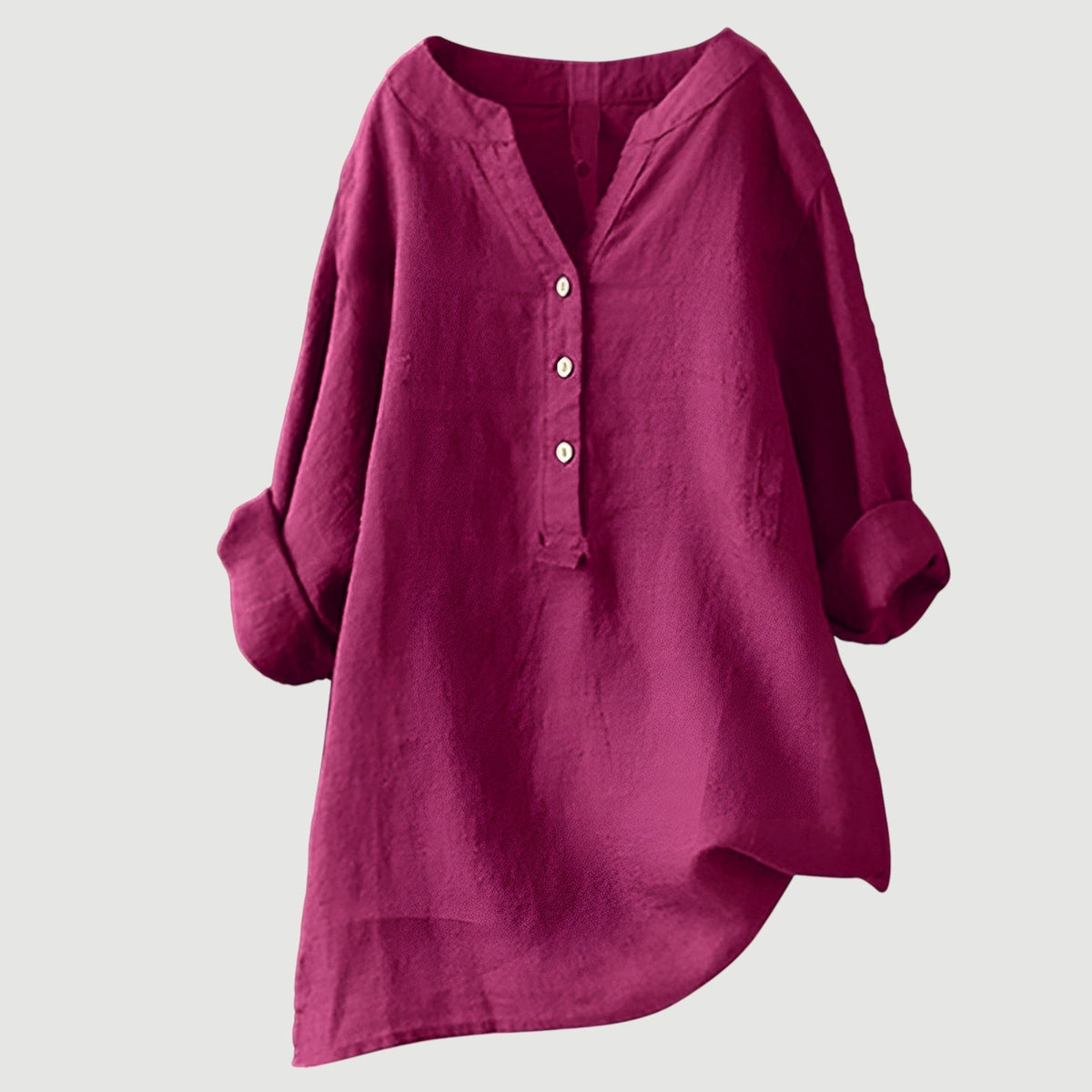 Chemise ample en lin rose fuchsia, encolure en V, patte boutonnée, manches larges.