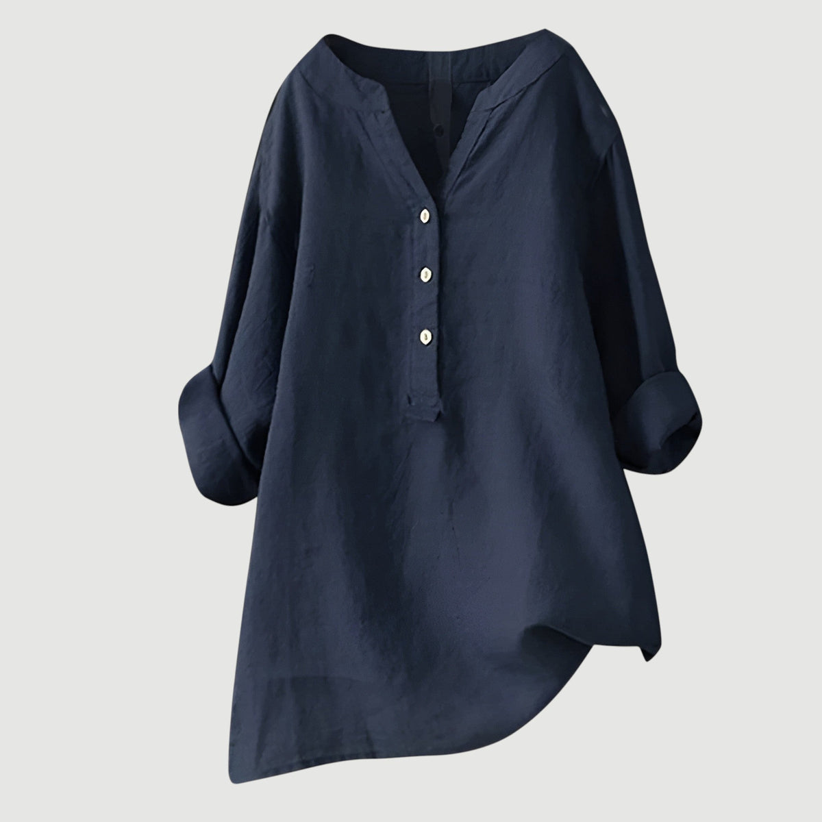 Chemise ample en lin bleu marine, encolure en V, patte boutonnée, manches larges.