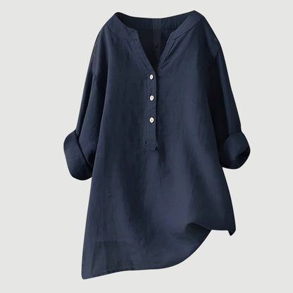 Chemise ample en lin bleu marine, encolure en V, patte boutonnée, manches larges.