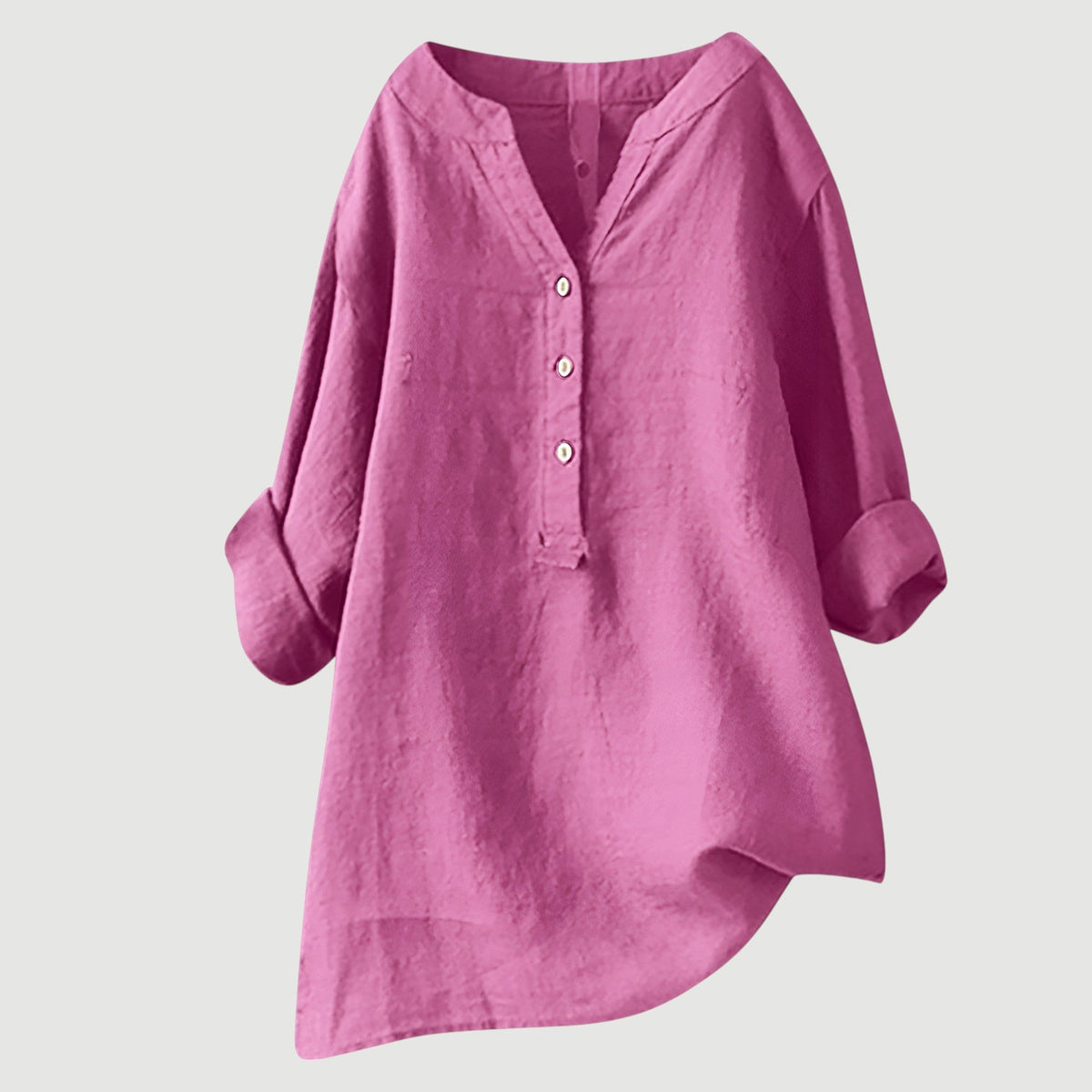 Chemise ample en lin rose, encolure en V, patte boutonnée, manches larges.