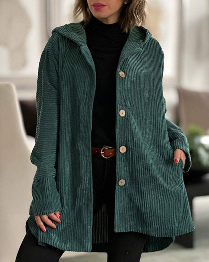 Veste en velours côtelé vert foncé à capuche, fermeture boutonnée, poches avant