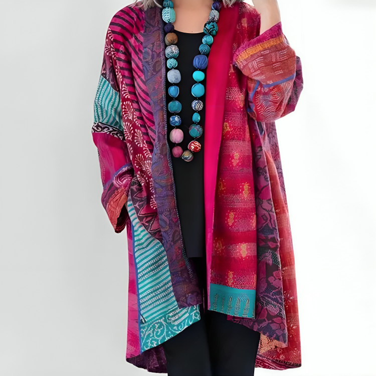 Gilet long rose bordeaux à motifs, manches kimono, bordures turquoises.