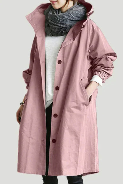 Manteau trench déperlant rose avec patte boutonnée et revers