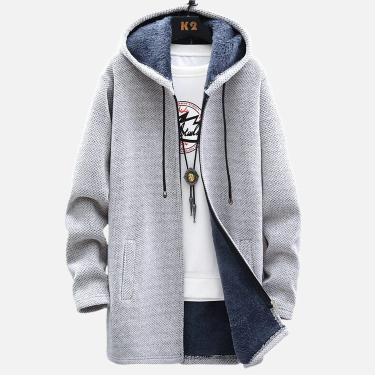 Cardigan zippé à capuche gris clair, doublure contrastée, cordons et poches latérales.