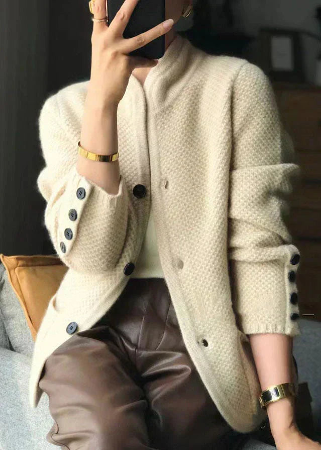 Gilet en cachemire blanc à boutons, texture côtelée, revers de col