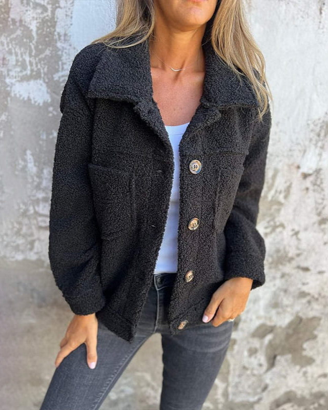 Veste en fausse fourrure noire, col chemise, boutons pression ronds