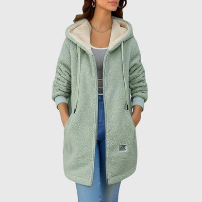 Veste en polaire vert menthe à capuche, fermeture zippée, poches latérales.