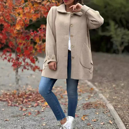 Manteau oversize beige à col chemise, boutonné, poches plaquées