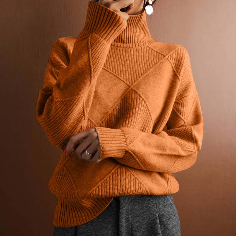 Pull en tricot orange à col roulé, torsades en losanges, maille côtelée
